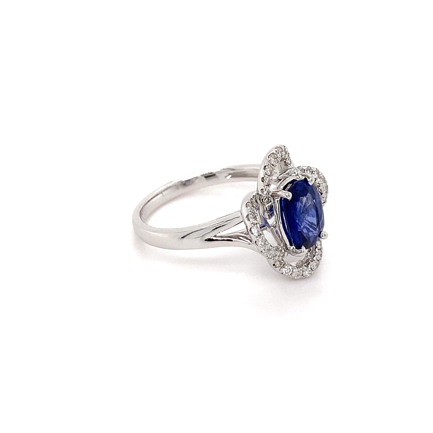 1.5ct Oval Sapphire + 0.34ct Dia Halo 18kt