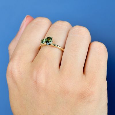 1.05ct Oval + 0.34ct Round Green Sapphire Ring 9kt YG