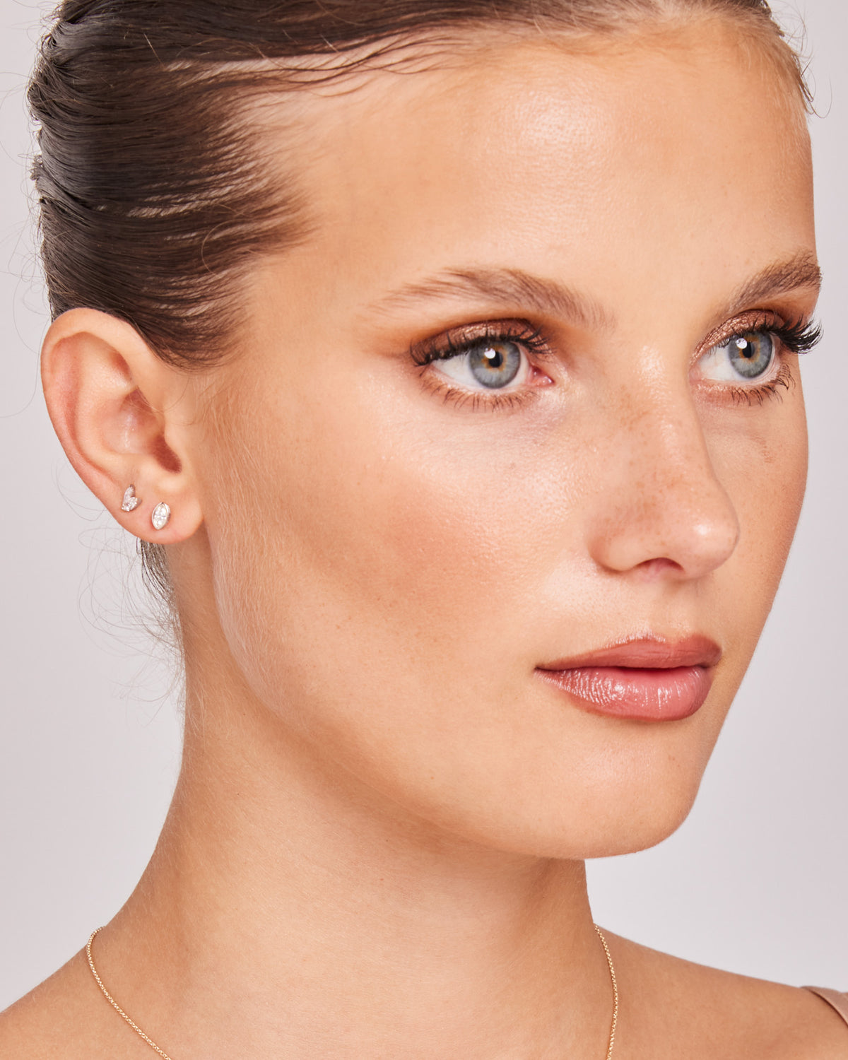 Model wearing 0.32ct Lab Grown Diamond Stud Earrings in 9K White Gold