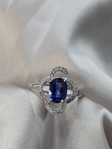 1.5ct Oval Sapphire + 0.34ct Dia Halo 18kt