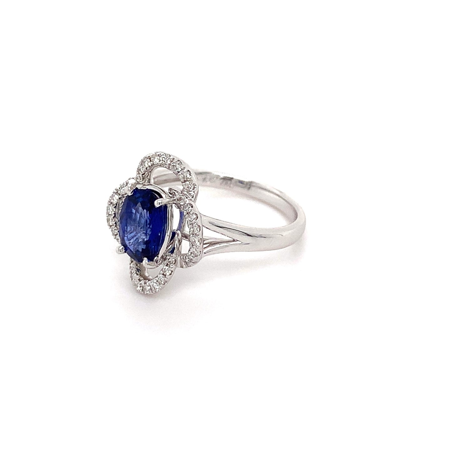 1.5ct Oval Sapphire + 0.34ct Dia Halo 18kt