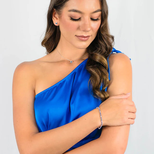 MILESTONE SAP BLUE ZIRCONIA HALO EARRINGS IN SILVER