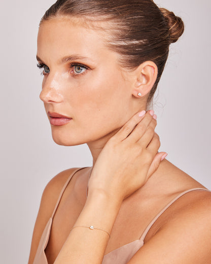 Model wearing 0.15ct Lab Grown Diamond 16-18cm Bracelet in 9K Yellow Gold