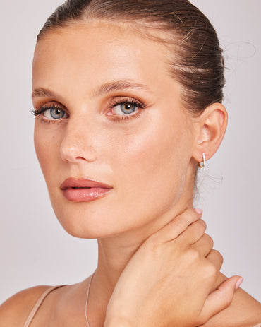 Model wearing 0.10ct Lab Grown Diamond Hoop Earrings in 9K Yellow Gold