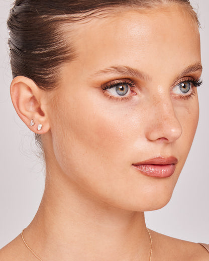 Model wearing 0.32ct Lab Grown Diamond Stud Earrings in 9K White Gold