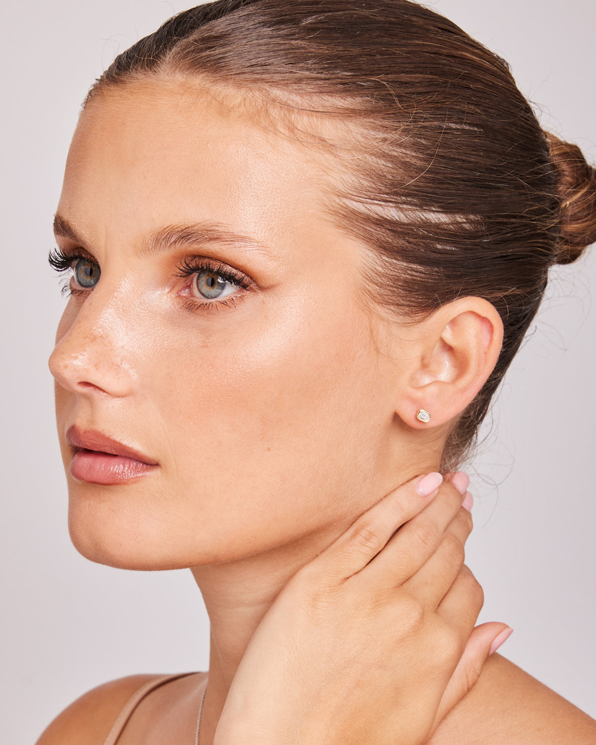 Model wearing 0.3ct Lab Grown Diamond Earrings in 9K Yellow Gold