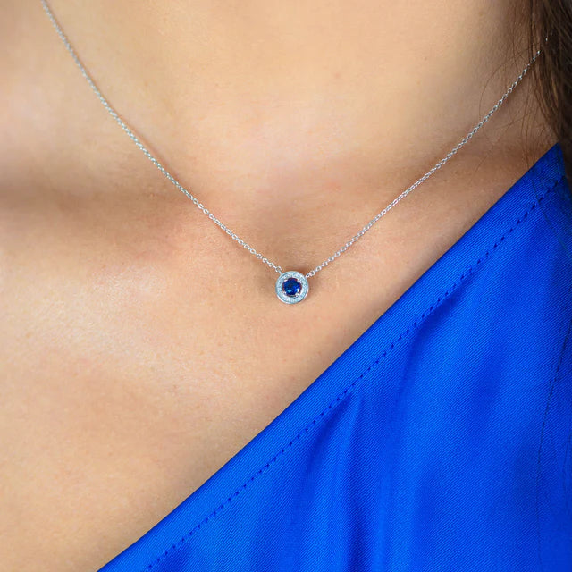 MILESTONE SAP BLUE ZIRCONIA HALO PENDANT IN SILVER
