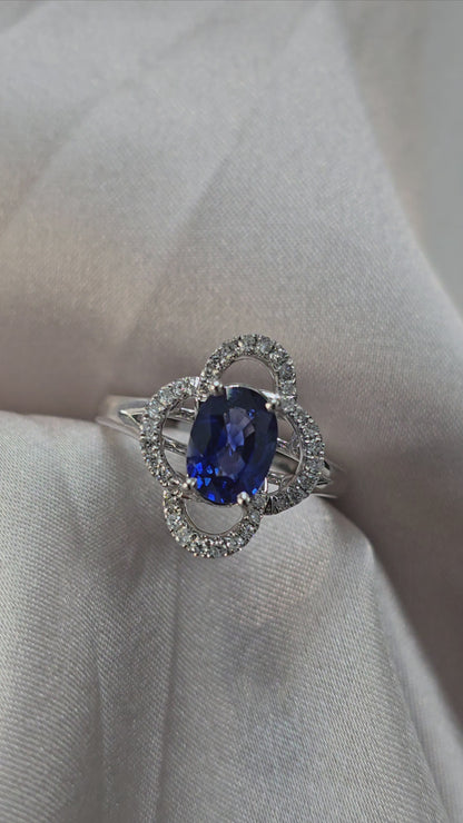 1.5ct Oval Sapphire + 0.34ct Dia Halo 18kt